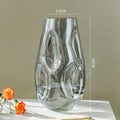 Vaso Aura vidro escultural com flores secas em ambiente nórdico