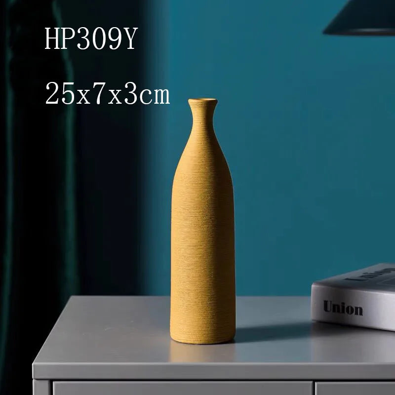 Vaso cerâmico branco clássico, ideal para decoração elegante de casa ou escritório. Perfeito para entradas, salas e como presente sofisticado para esposa ou mãe.